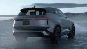 A rear three-quarter view of the grey Toyota Land Cruiser Se electric concept SUV.