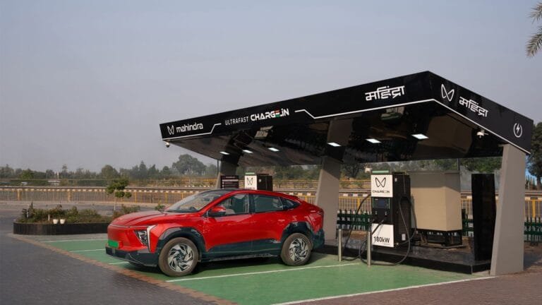 Red Mahindra BE 6 or XUV.e9 electric SUV charging at the new 180kW ultrafast Mahindra Charge_IN station located at Murthal on NH-44.